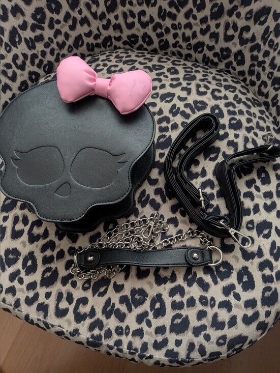 Hot Topic Handbags - Monster High Skullette figural crossbody bag, likely from Hot Topic, Pink Bow